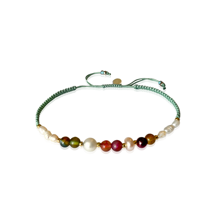 Adjustable handmade Bracelet braided with 6 beautiful gemstones and 8 Freshwater pearls. The colors are soft and elegant.