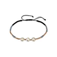 Load image into Gallery viewer, Adjustable handmade Bracelet braided with 3 beautiful Freshwater pearls and high quality gold glass pearls. The bracelet is straightforward and elegant with Gray pearls and black ribbon and gives endless possibilities to mix and match.
